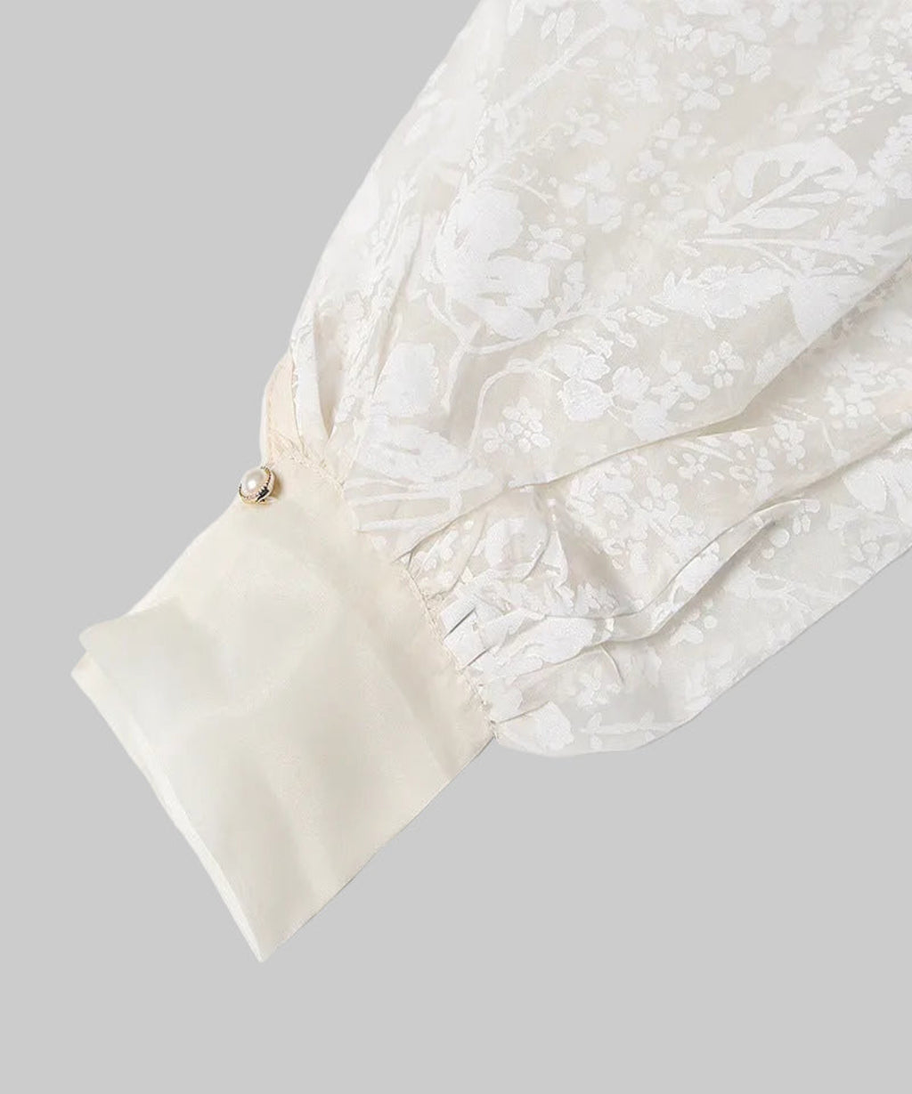 White textured bag with a small pouch on a light gray background
