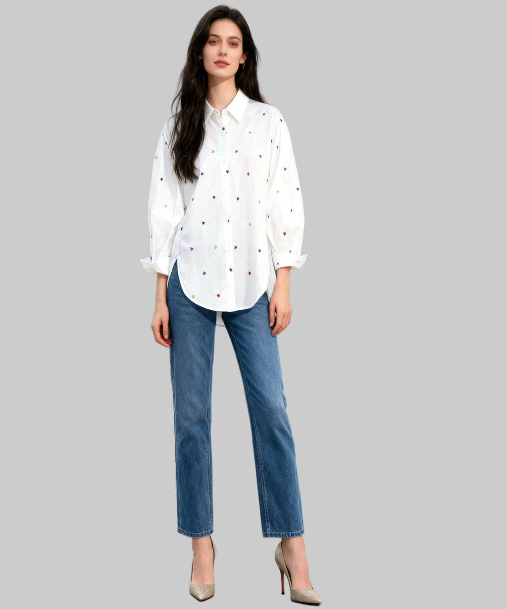 WOMEN WEARING WHITE SHIRT AND JEANS ON A WHITE BACKGROUND