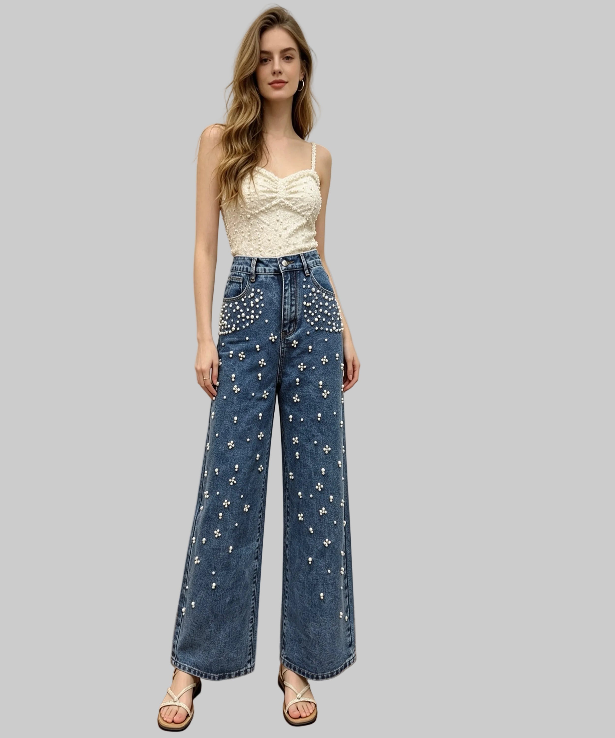 Woman wearing blue jeans with star patterns on a white background