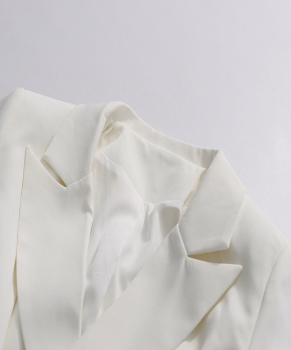 Close-up of a white fabric texture on a light gray background