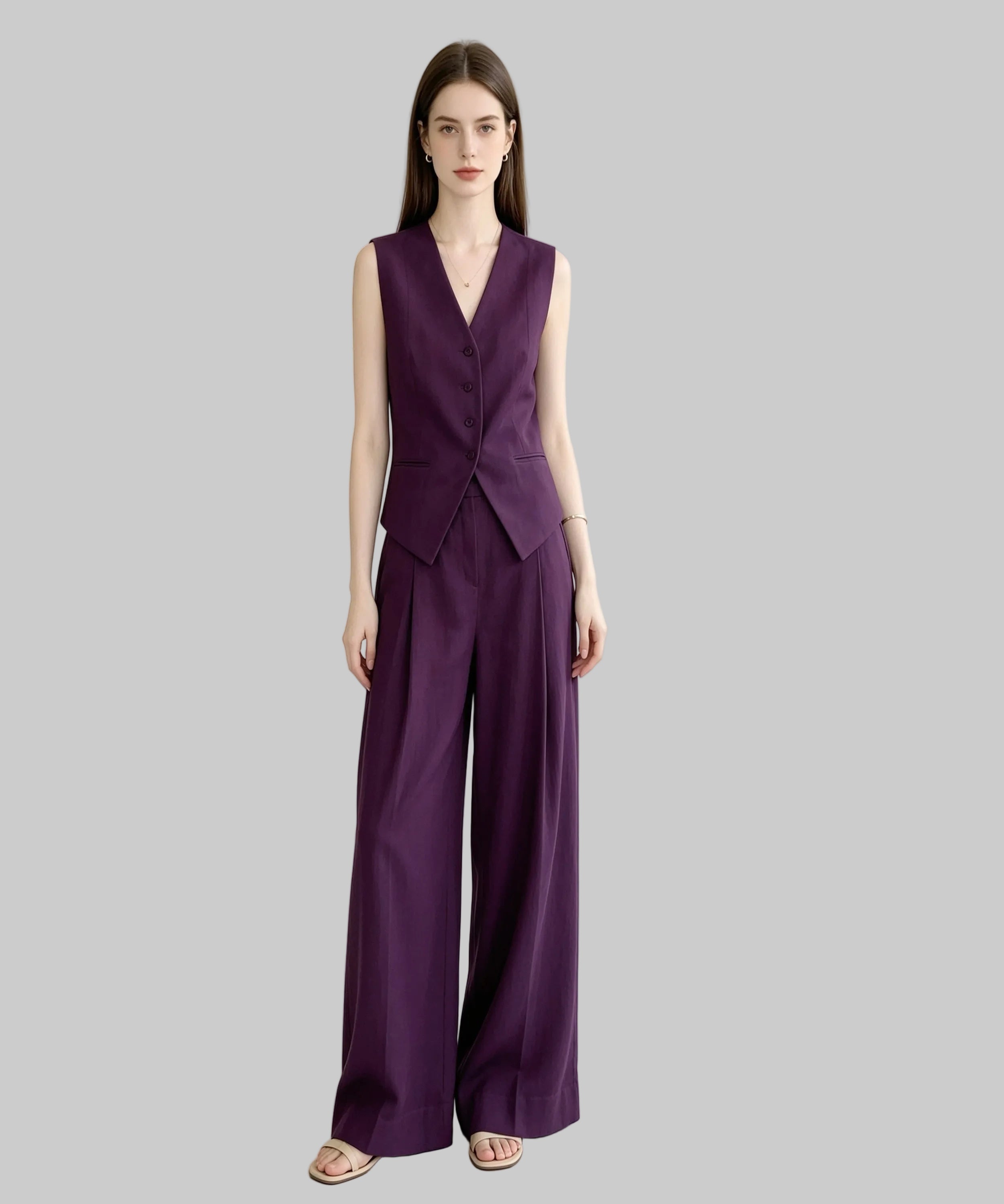 Woman wearing a purple suit on a white background