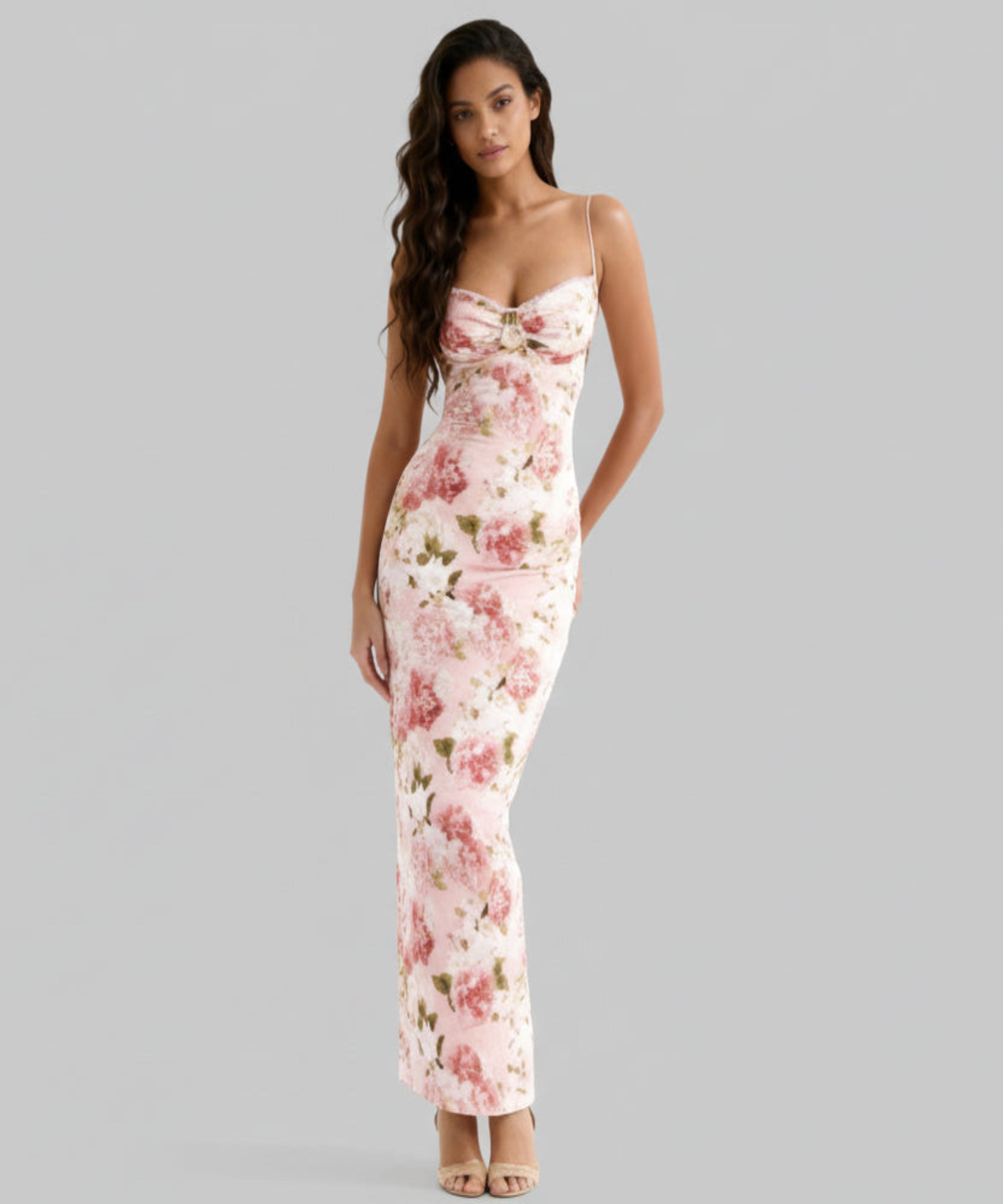 Woman wearing a floral dress on a white background
