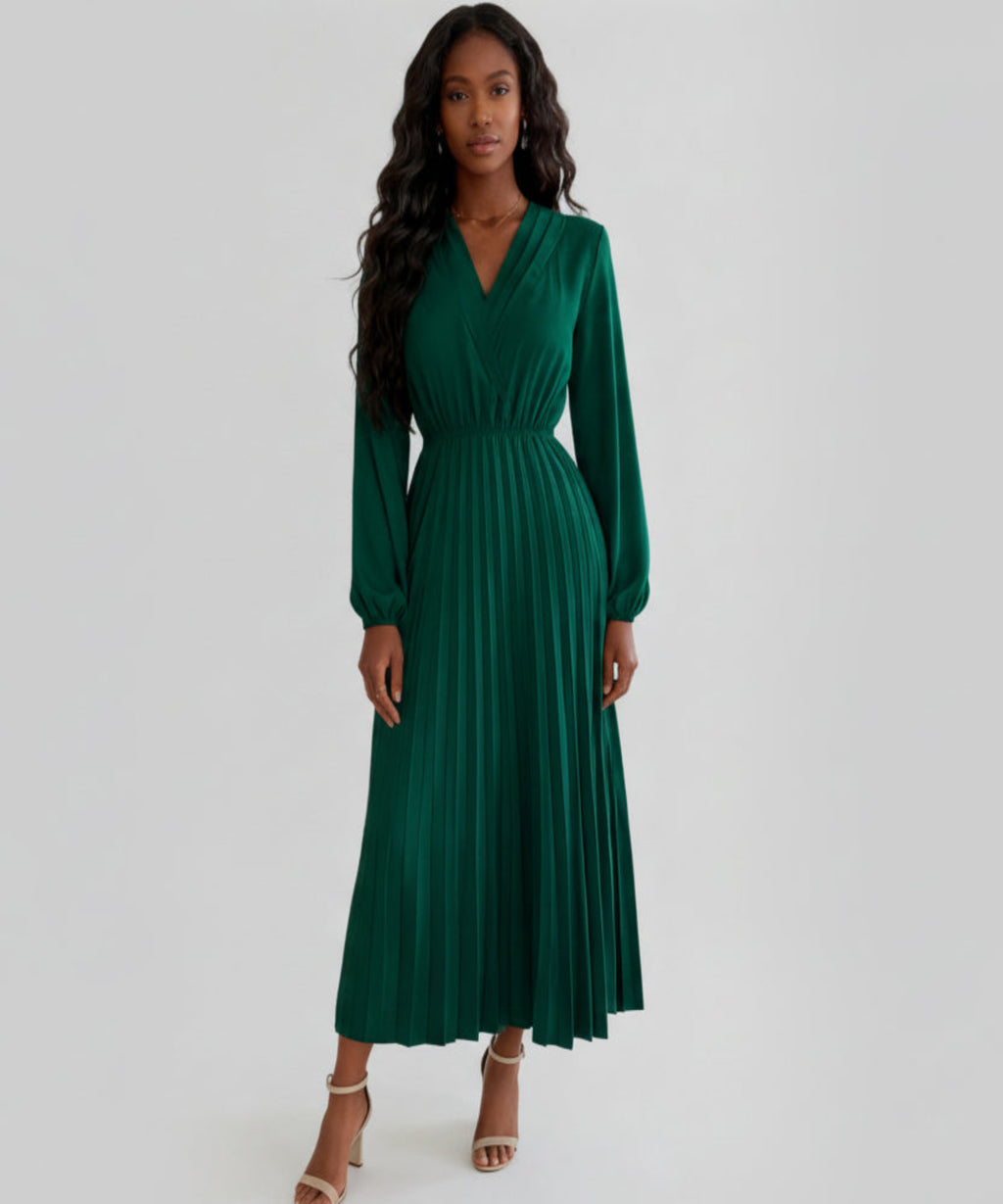 Woman wearing a green dress on a white background