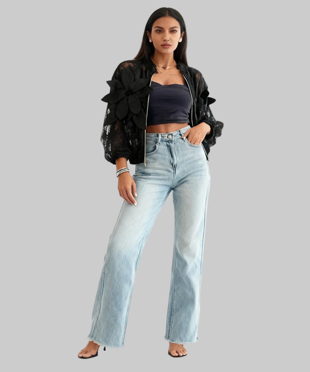beautiful women wearing jeans and black top sit on a white background