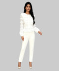 Woman wearing a white outfit on a white background