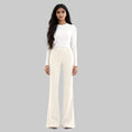 Asian women dressed on a white clothes sits on a white background