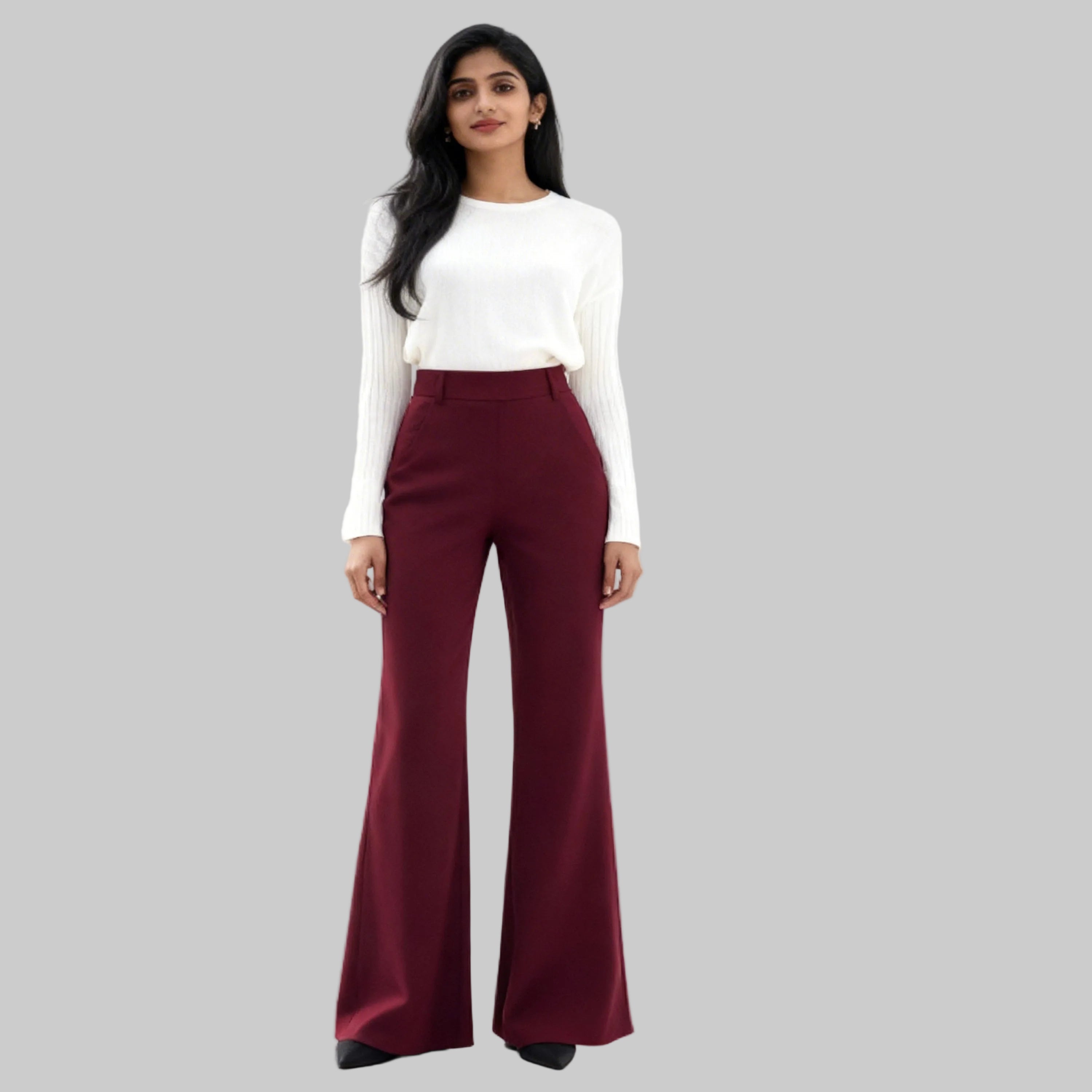 Asian women dressed with wine red trousers sits on a white background