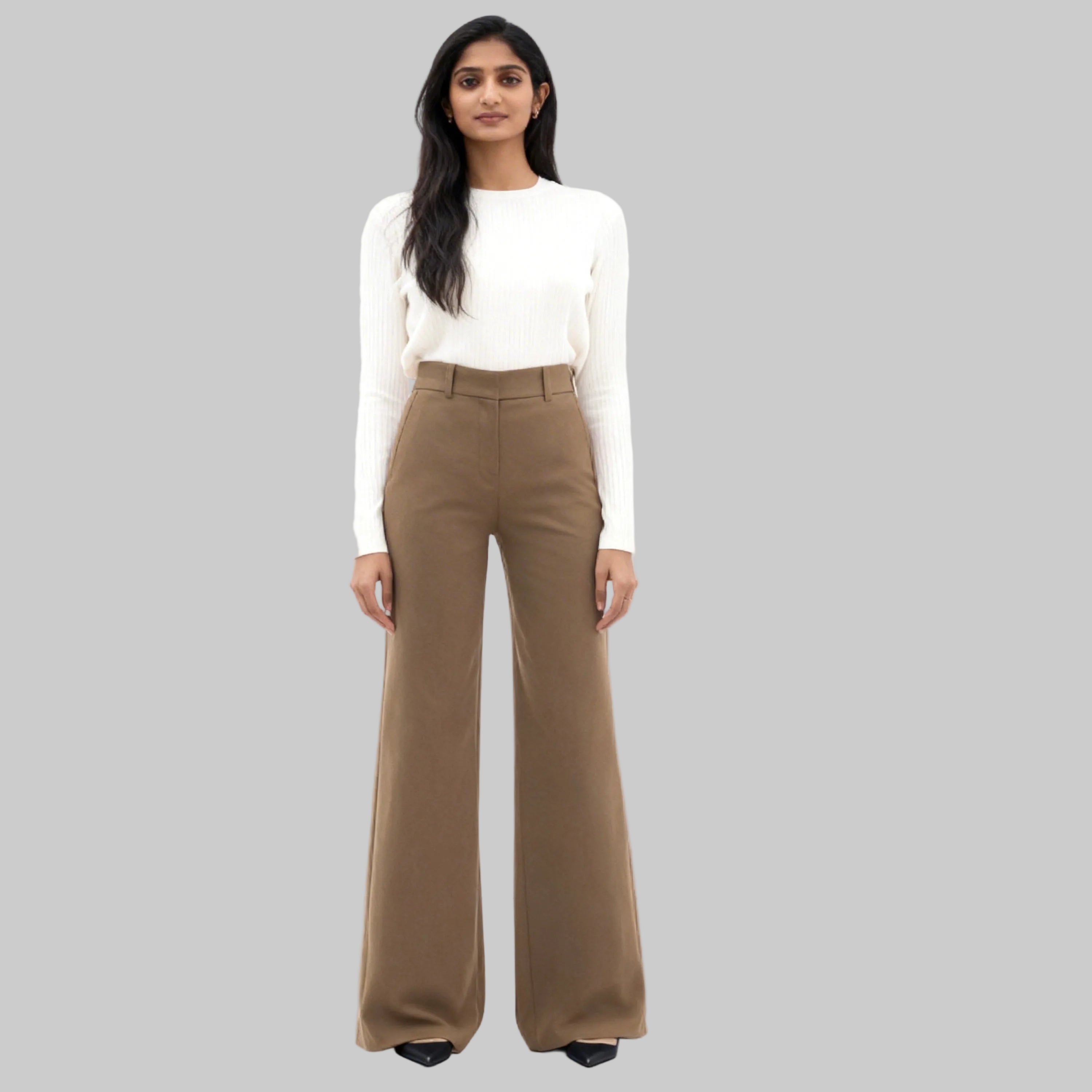 women dressed casual with beige trousers siting on a white background