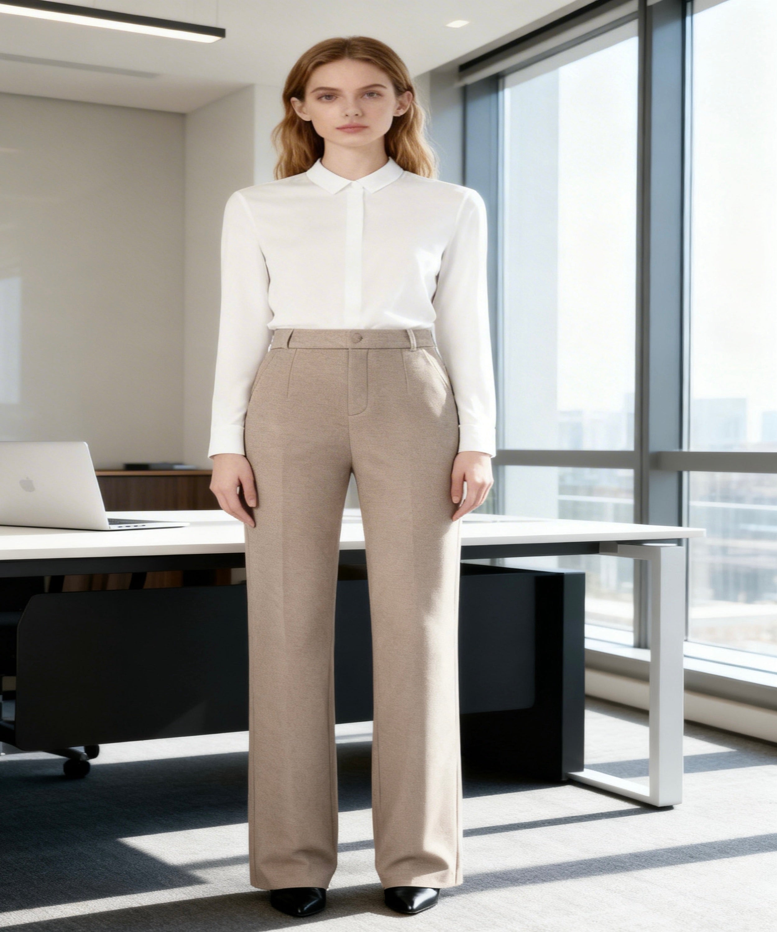 blonde women sits in front of the office