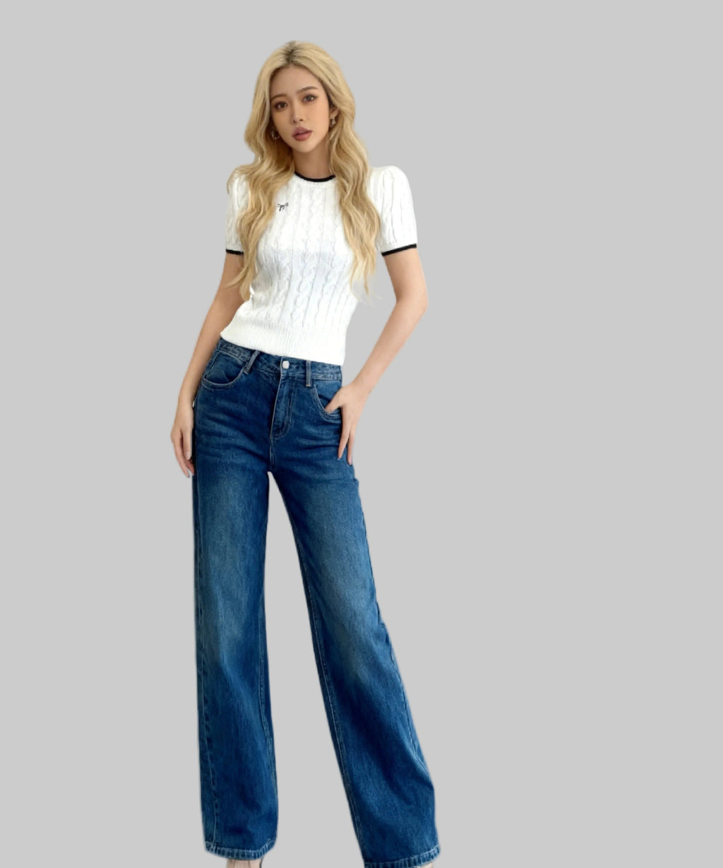 Asian women dressed casual sits on a white background