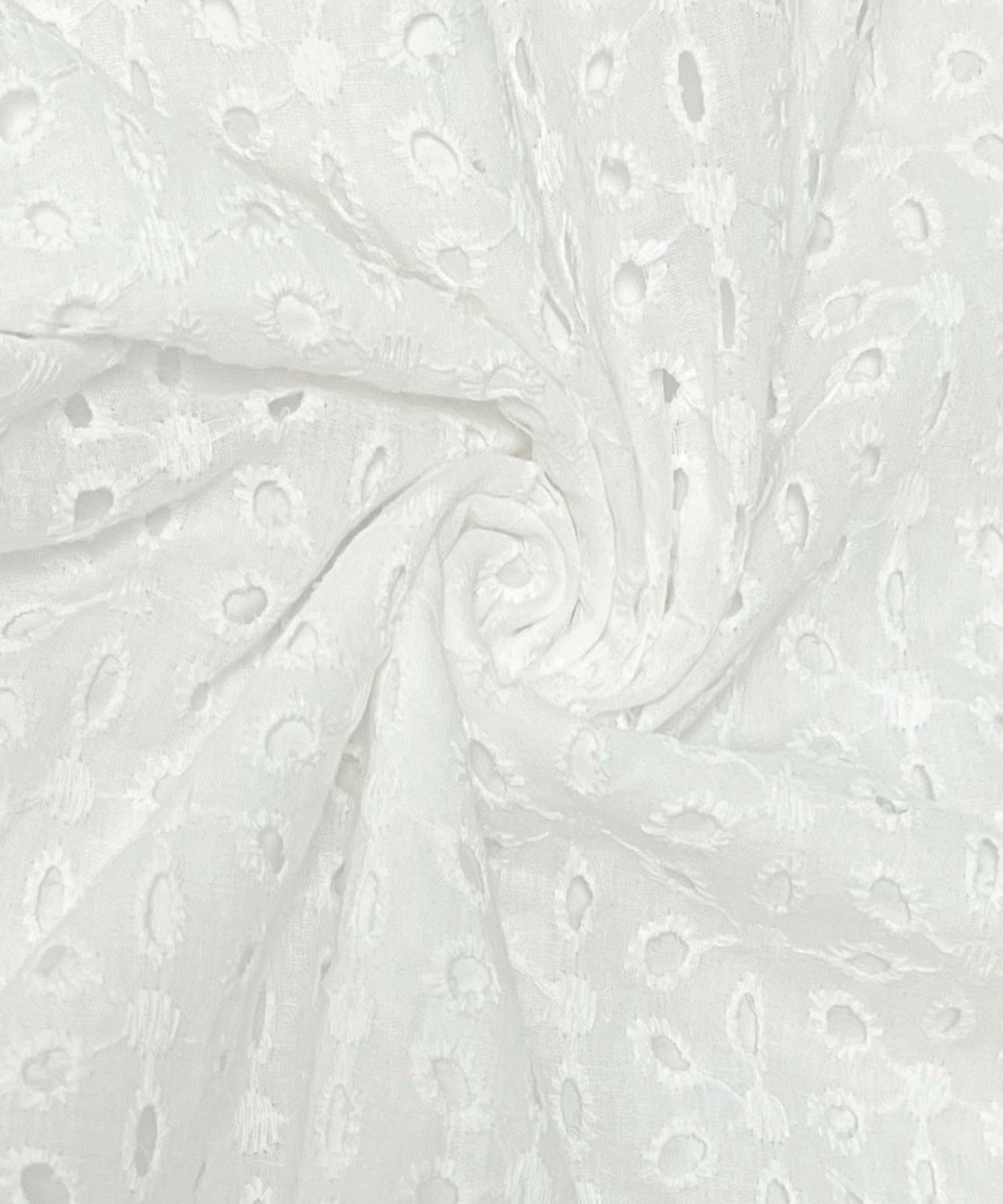 White fabric with subtle pattern on a white background