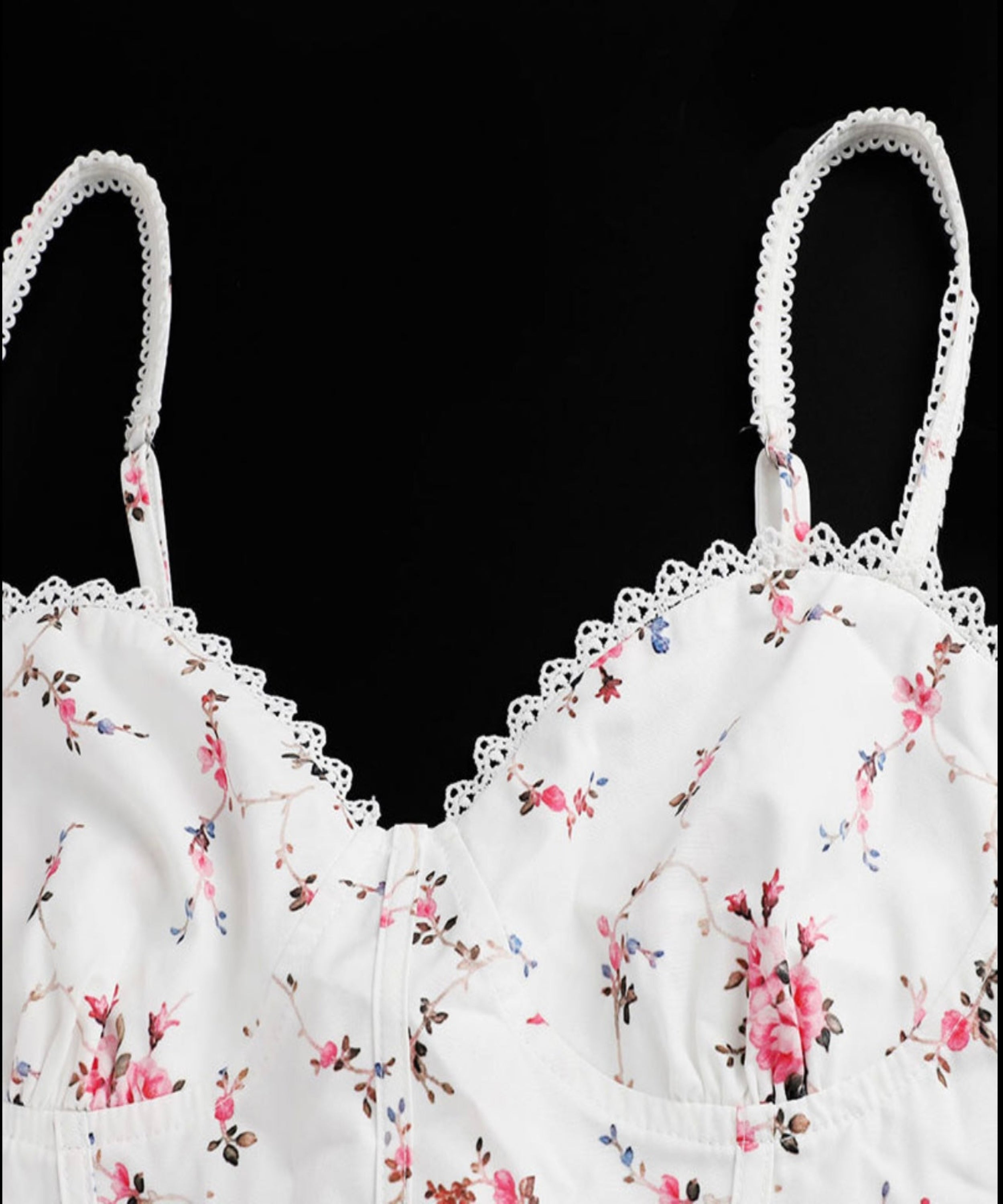 Floral-patterned bralette on a black background
