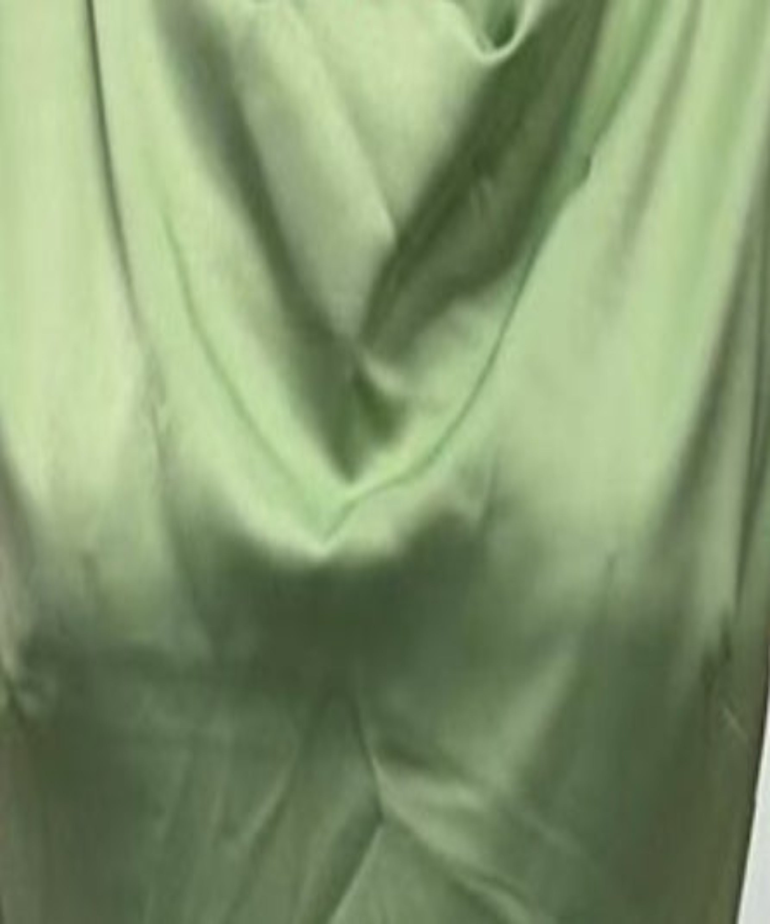Close-up of light green fabric texture