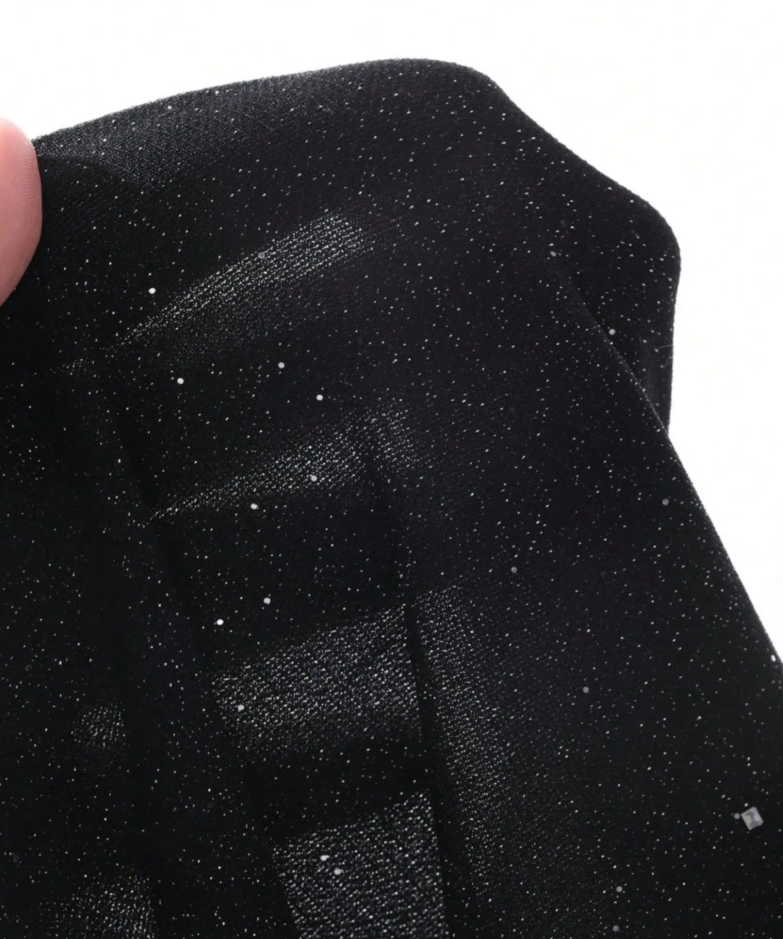 Close-up of black fabric with a textured pattern