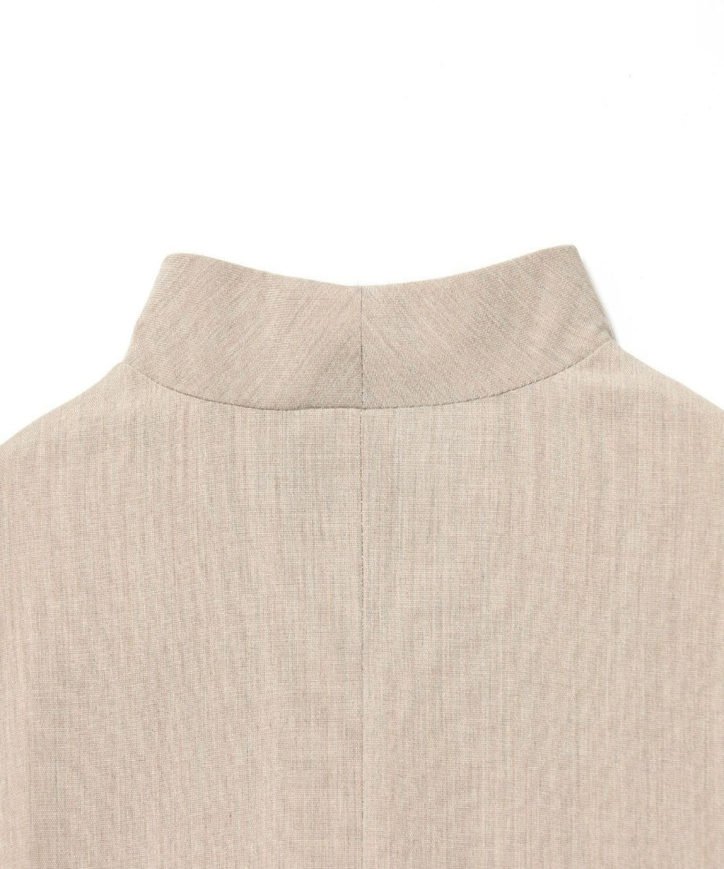 Close-up of a beige fabric texture on a white background