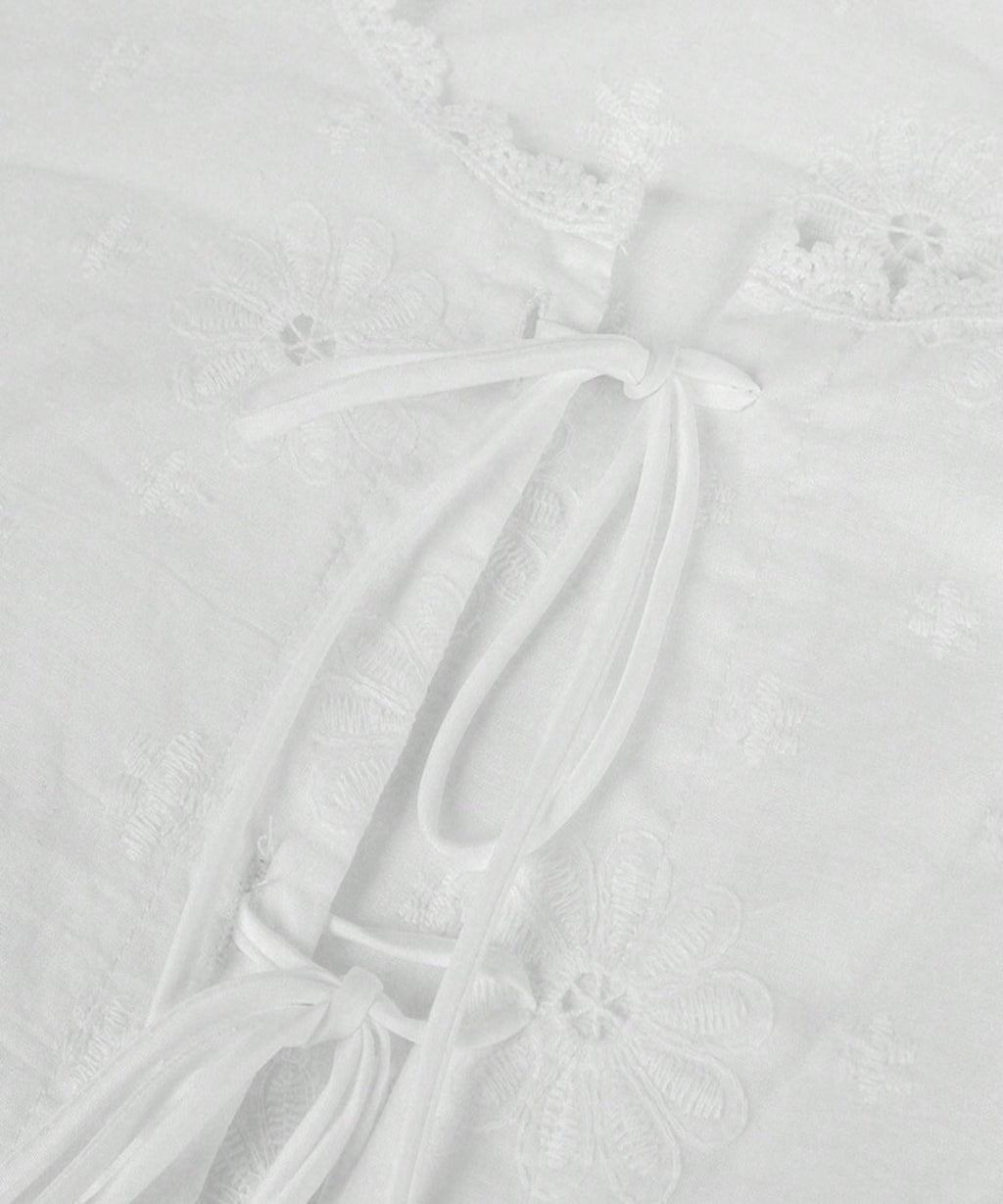 Close-up of a textured white surface with subtle patterns