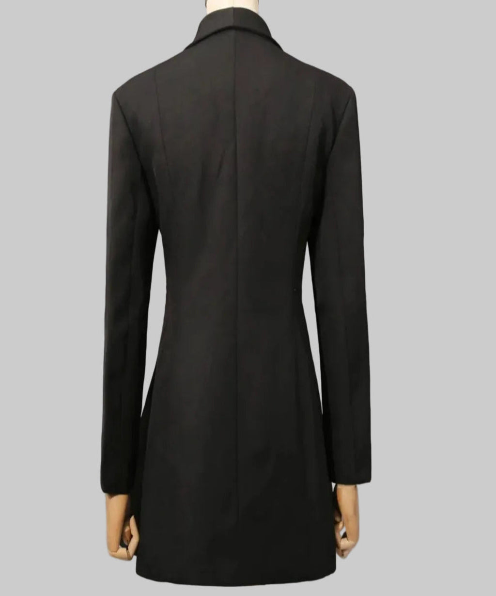 Black coat on a mannequin against a gray background