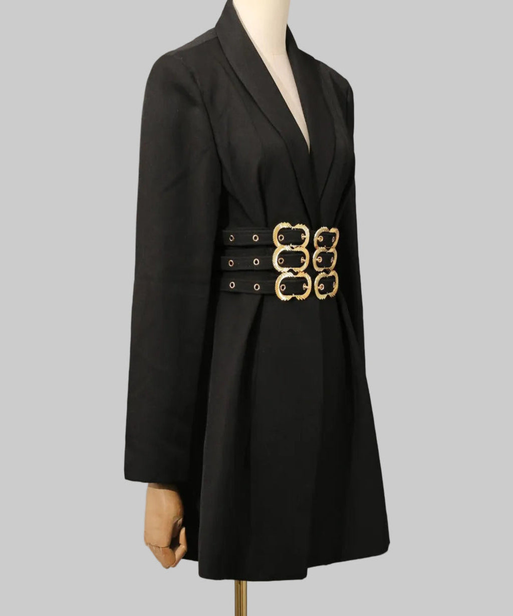 Black blazer with gold belt on a mannequin against a gray background