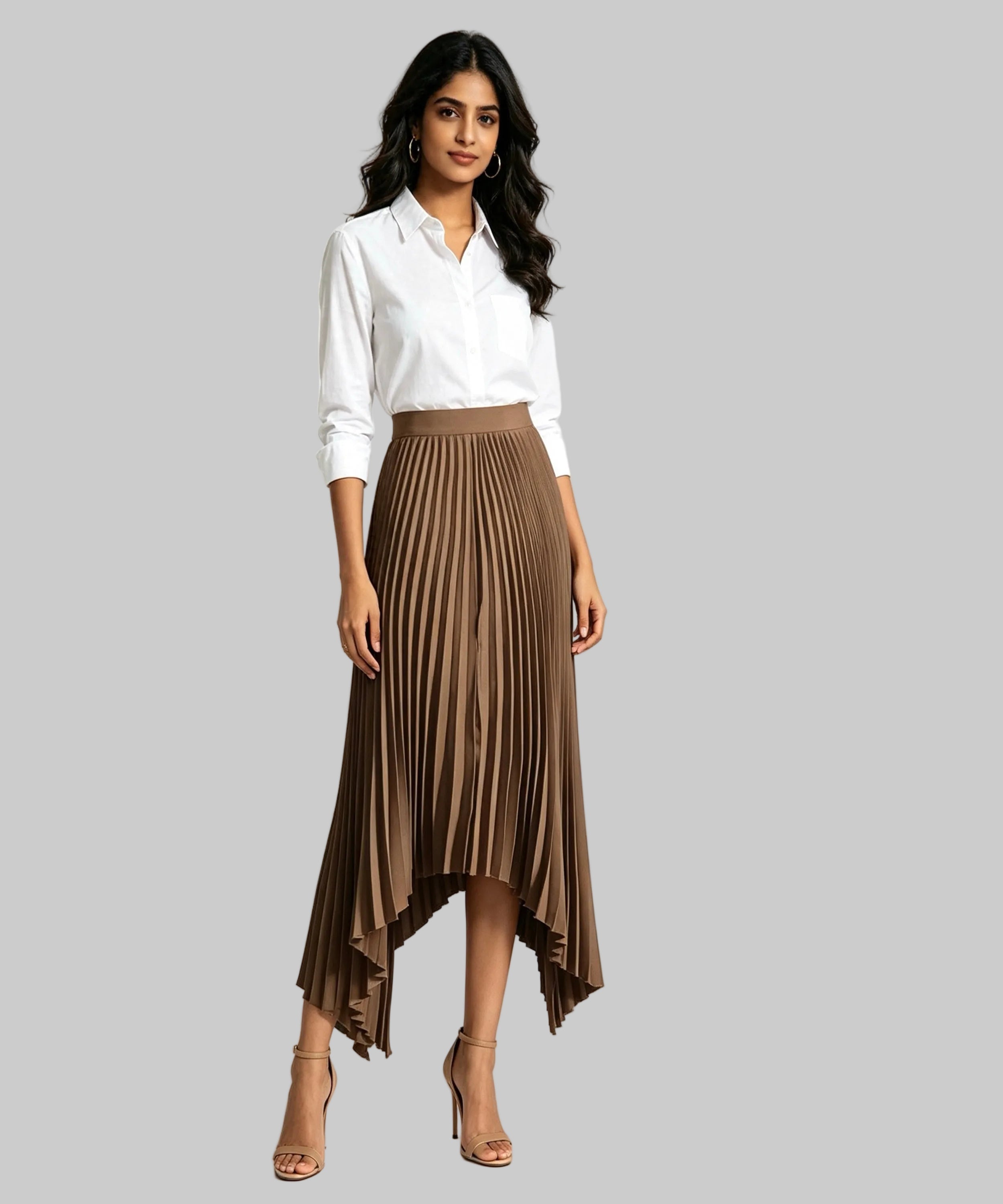 Woman wearing a white blouse and brown pleated skirt on a white background