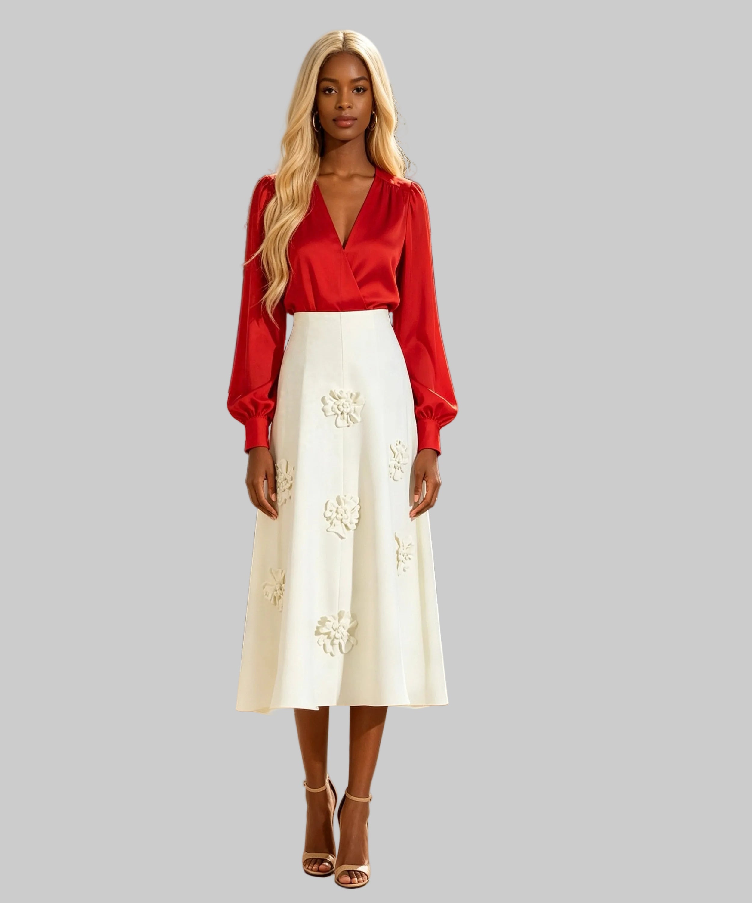Woman in a red blouse and white skirt standing on a white background