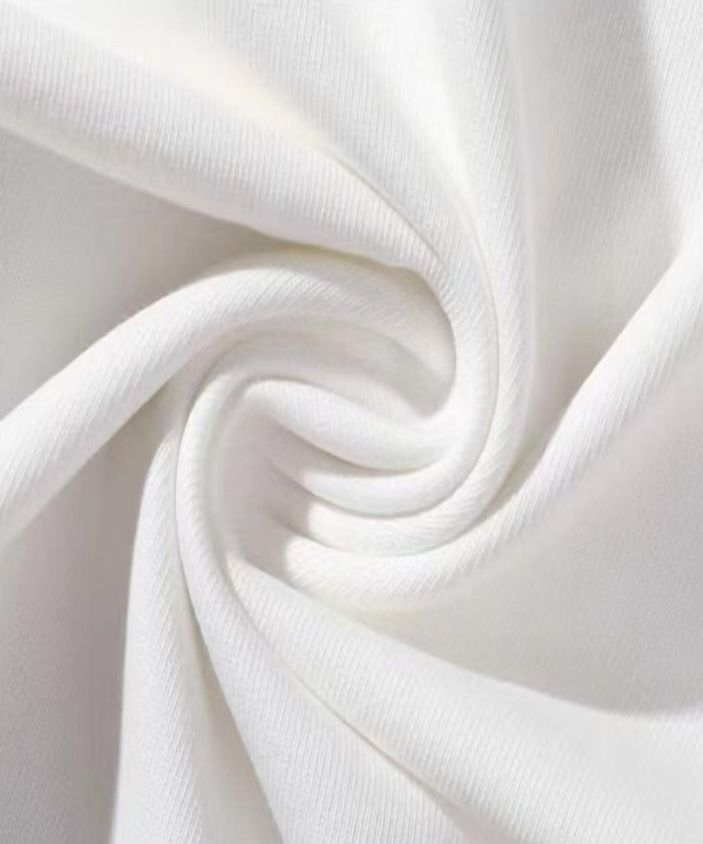 Close-up of white fabric with a subtle texture
