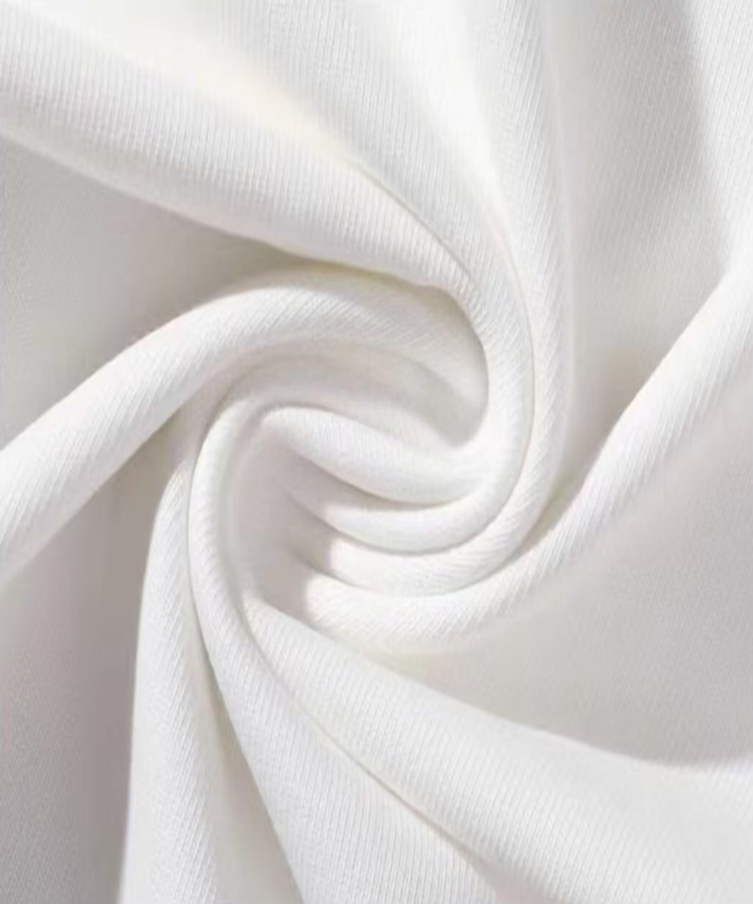 Close-up of white fabric with a subtle texture