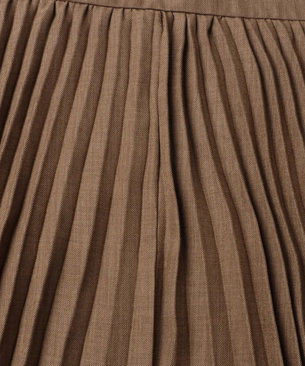 Close-up of pleated brown fabric