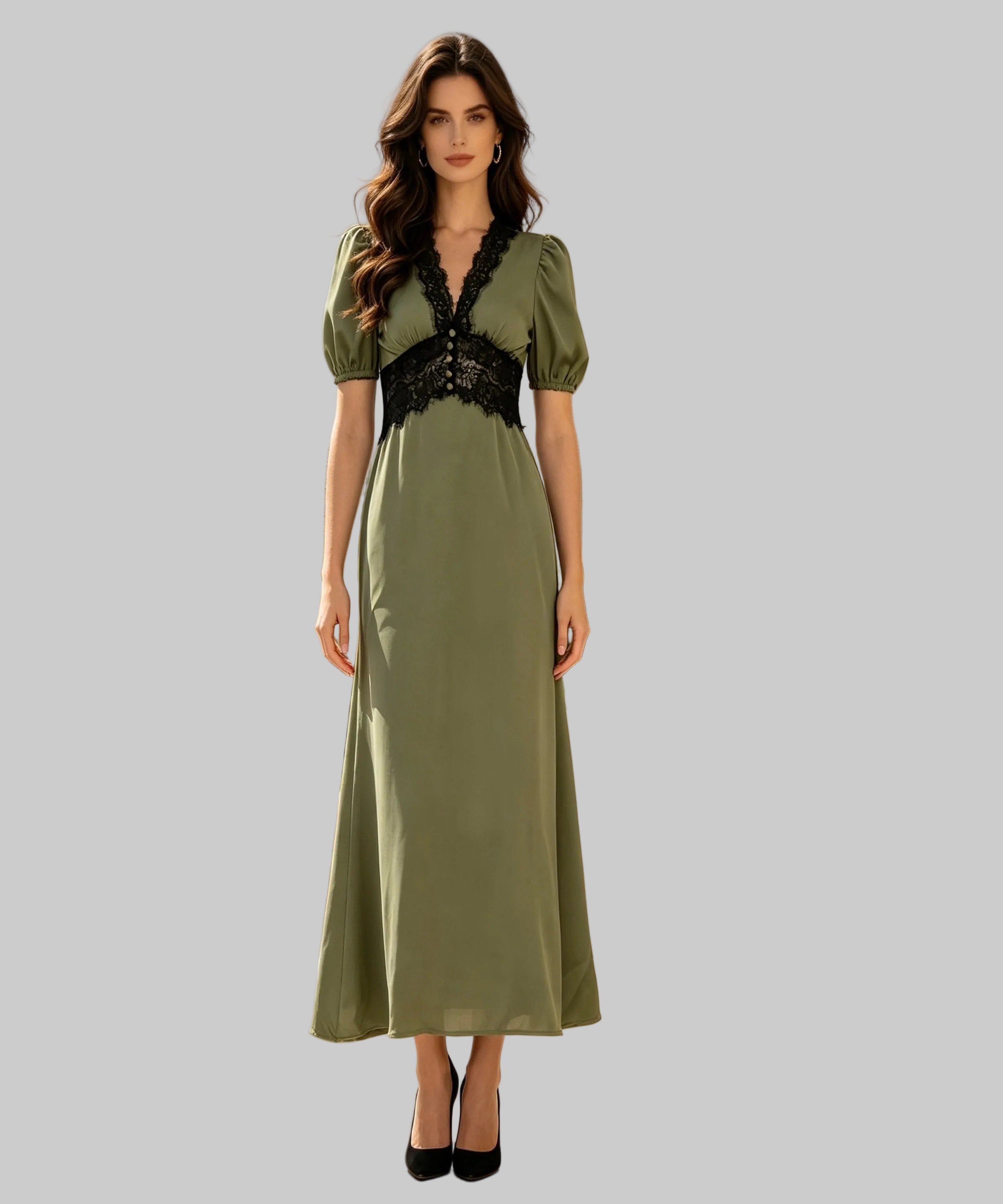 A woman stands on a white background wearing a midi-length olive green dress with puff sleeves, a V-neckline, and a black lace waistband. 